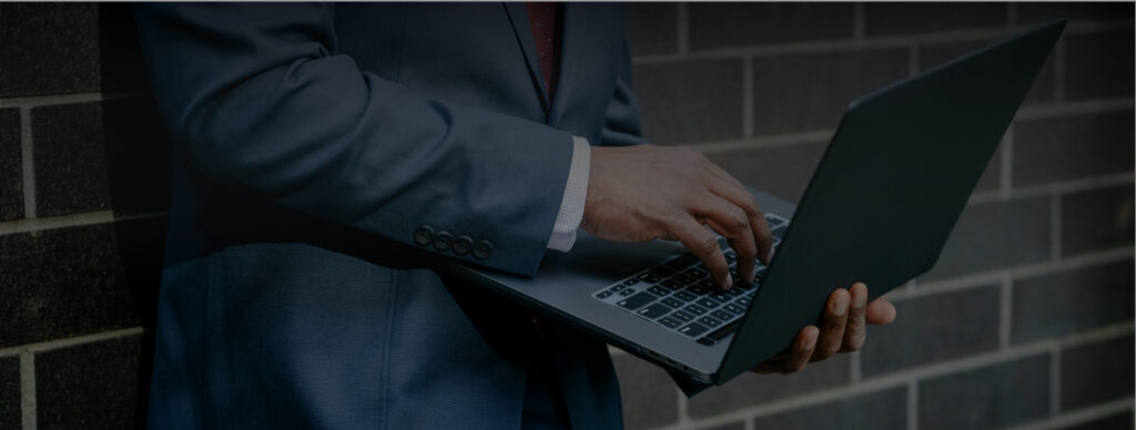 Man holding laptop